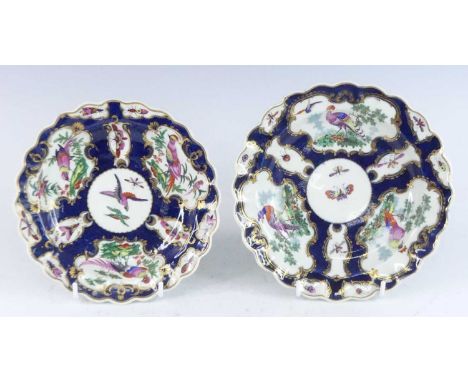 Two first period Worcester porcelain dishes, circa 1770, each enamel decorated with cartouches of birds and insects upon a bl
