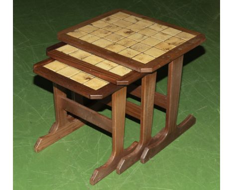 A nest of tile topped tables