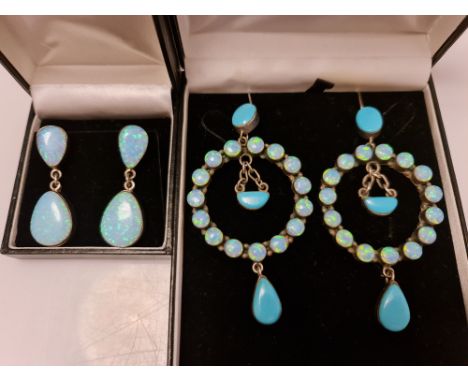 A pair of synthetic opal pear cut drop earrings, together with a pair of synthetic opal and reconstituted turquoise circle de