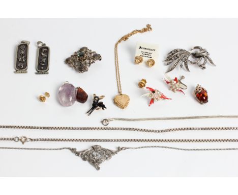 A selection of jewellery to include, marcasite necklet, amethyst pendant, stud earr-ings, deer button hole, hieroglyph pendan