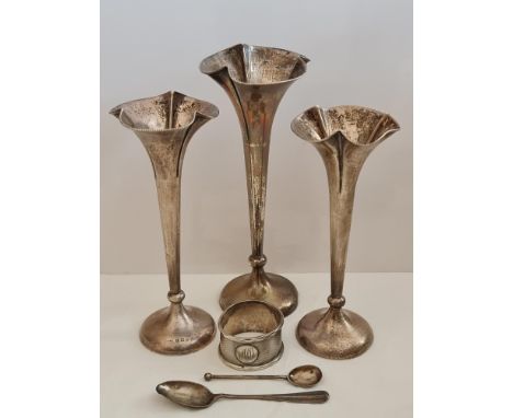 A collection of hallmarked silverware, to include a pair of weighted posey vases and another of similar design, two spoons an