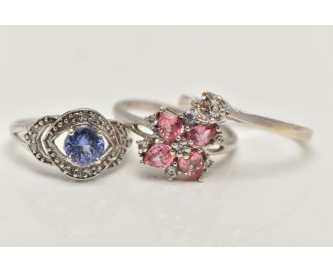 THREE GEM SET RINGS, to include a 9ct white gold single stone diamond ring, round brilliant cut diamond, claw set, estimated 