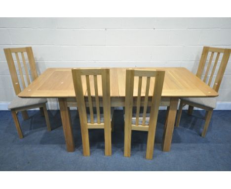 A MODERN LIGHT OAK EXTENDING DINING TABLE, with two additional leaves, extended length 199cm x closed length 132cm x depth 92