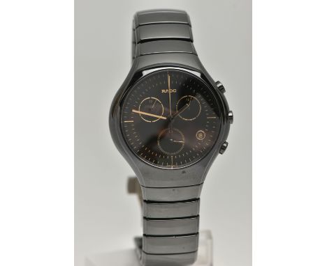 A GENTS 'RADO DIASTAR' WRISTWATCH, round black dial signed 'Rado' gold detailed markers, date window at the four o'clock posi