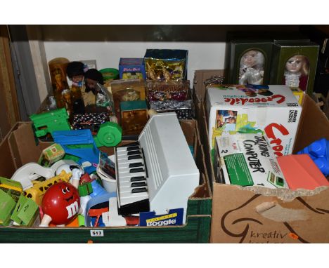 FOUR BOXES OF TOYS AND SOUVENIR DOLLS, to include six Palitoy 'Pocketeers' games, a collection of traditional souvenir dolls 