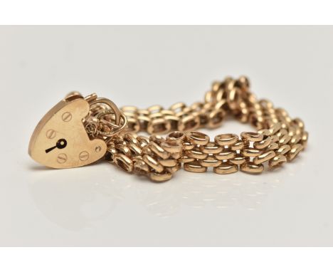 A 9CT GOLD BRACELET, brick link bracelet, hallmarked 9ct Birmingham, fitted with a heart padlock clasp hallmarked 9ct London,