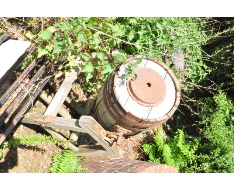 A VINTAGE LARGE OAK BARRELLED BUTTER CHURN on pine stand and a coopered oak barrel (distressed) width 70cm depth 72cm height 
