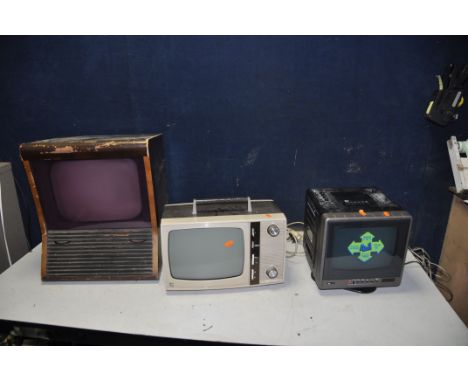 THREE VINTAGE TELEVISIONS comprising of a 1950s Pye tv with walnut case (poor condition), a Philips Portable and a Pye 23BC p