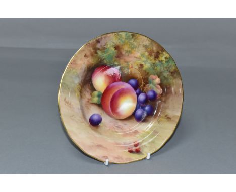 A ROYAL WORCESTER 'Fallen Fruits' design plate, decorated with peaches, grapes and berries, diameter 16cm, signed by Moseley 