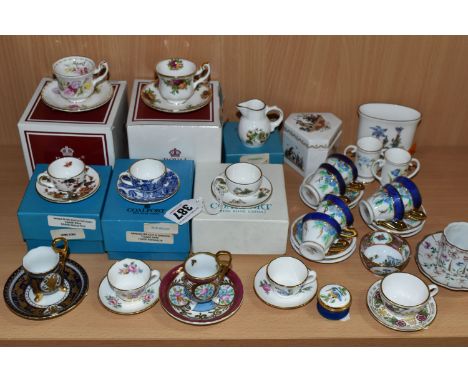A COLLECTION OF MINIATURE CUPS AND SAUCERS, ETC, to include boxed teacups in Royal Albert Old Country Roses and Flowers of th