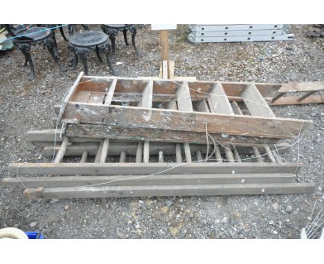 TWO SETS OF WOODEN SIX STEP STEP LADDERS, tallest 148cm, and six ladder sections that have been cut down from larger ladders 