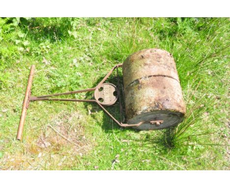 A VINTAGE 'IRONCRETE' GARDEN ROLLER with concrete roller and iron frame width 45 cm height 100cm Condition replace(these item