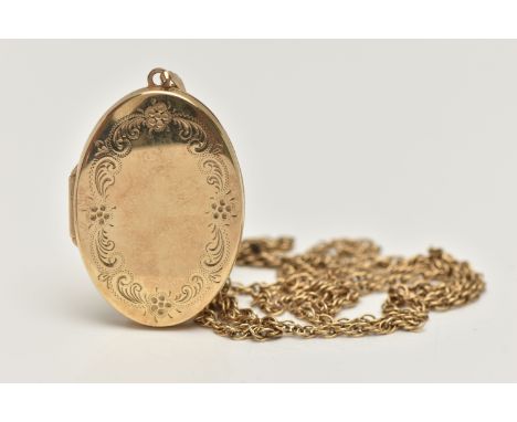 A 9CT GOLD LOCKET AND CHAIN, oval locket with floral detail to the front, opens to reveal two compartments, fitted with a tap