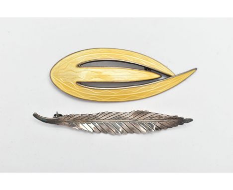TWO WHITE METAL BROOCHES, the first a 'Askel Holmsen' brooch with yellow guilloche enamel detail, stamped 'Norway Sterling 92