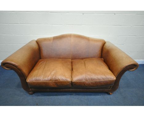 A BROWN LEATHER TWO SEATER SETTEE, with scrolled armrests, length 199cm x depth 97cm x heigh 90cm (condition:-discoloured top