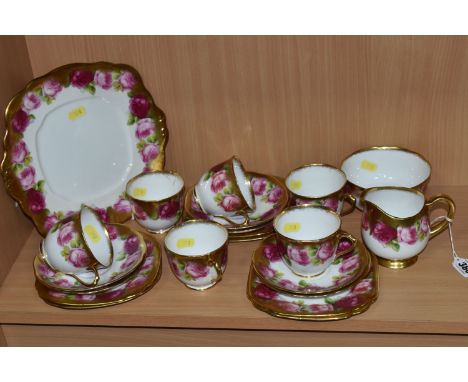 A ROYAL ALBERT OLD ENGLISH ROSE PATTERN TEA SET, comprising a square cake plate, milk jug (hairline crack in base), sugar bow