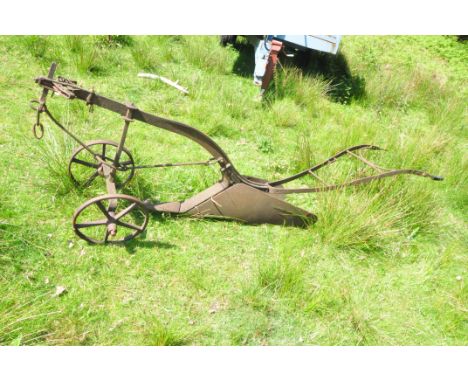 A VINTAGE HOWARD DD2 CAST IRON FURROW with DD7 blades total length 275cm Condition pitted surface rust, one rubber handle mis