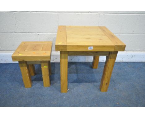 A SOLID LIGHT OAK SET OF TWO SQUARE TABLES, largest table 50cm cubed, and a dressing mirror (condition:-some marks to legs) (