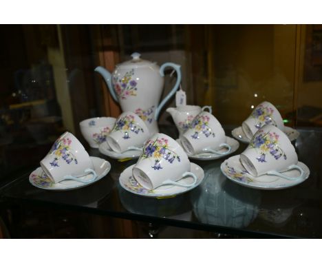 A SHELLEY 'WILD FLOWERS' PATTERN FIFTEEN PIECE COFFEE SERVICE, comprising a coffee pot, cream jug and sugar bowl, six coffee 