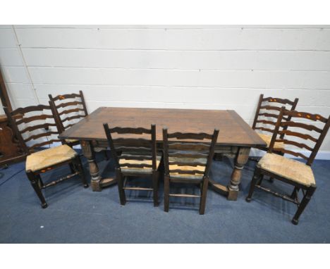 A REPRODUCTION OAK REFECTORY TABLE, labelled Henry Venables of Stafford, on block and turned legs, united by a shaped stretch