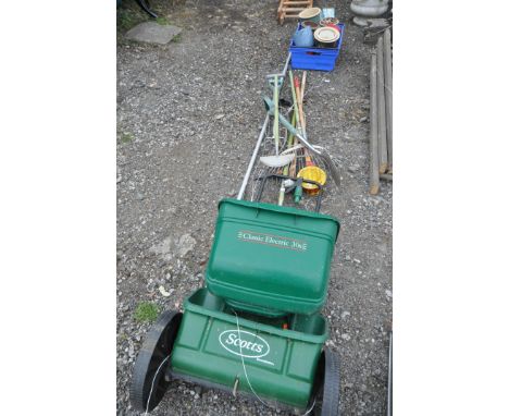 A SELECTION OF GARDEN TOOLS AND POTS, to include a rake, spade, etc, and a variety of glazed pots (20+)