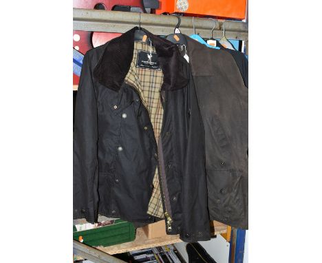 A GROUP OF CLOTHING, comprising two brown John Partridge waxed jackets, one labelled ladies size L, the other approximately 4