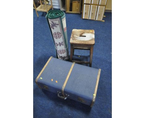 A BEECH HIGH STOOL, a blue traveling trunk, and two rugs (condition:-stool well water damaged, stains to rugs) (4)