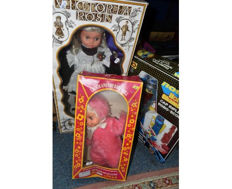 ONE BOX OF VINTAGE DOLLS AND BOARD GAMES, to include a boxed Soltoys Ltd. 'Laugh And Cry Baby Doll', a boxed Burbank Toys 'Vi