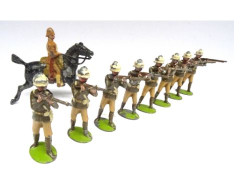 Britains set 119, Gloucestershire Regiment firing FIRST VERSION, oval bases, and one 6th Dragoon dated 1.6.1900 (Condition Fa