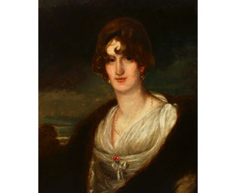 19th century English school, A bust length portrait of a Lady in pearls, oil on canvas, 30" x 25", in a carved wood frame.