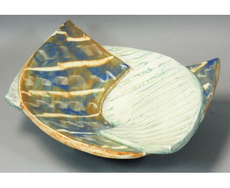 Carol McNicoll (b.1943), an unusual split ceramic bowl, in the form of two interwoven arches, painted signature to the base, 