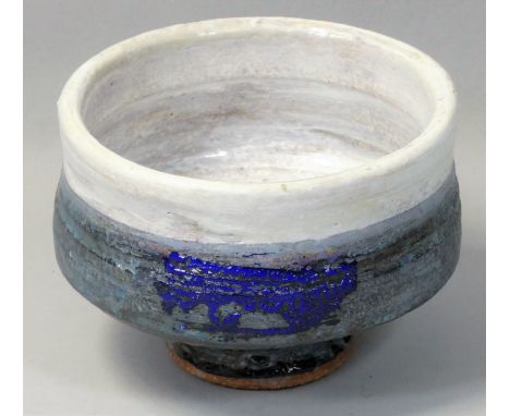 Robin Welch (1936-2019), a stoneware chawan, of cylindrical form, painted with shades of blue on an oatmeal ground, diameter 