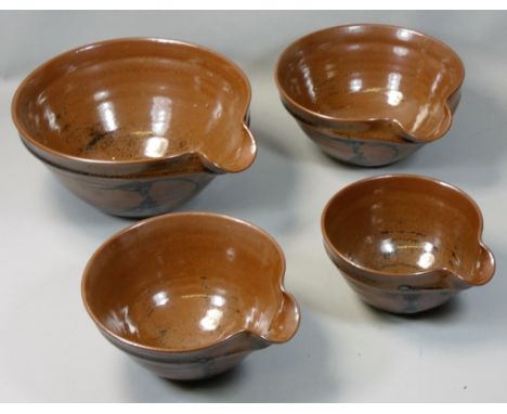 David Lloyd-Jones (1928 - 1994), a set of four stoneware graduated pouring bowls, each with embossed '3', largest diameter 25