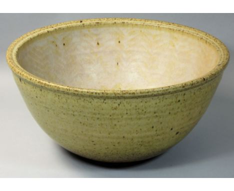 David Lloyd Jones (1928 - 1994), a large stoneware bowl, oatmeal glaze, impressed early mark, diameter 31cm. Provenance: ex l