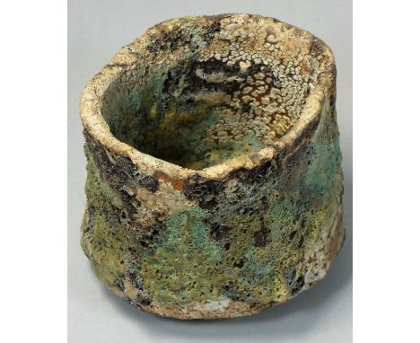 Ewen Henderson (1934 - 2000), a large hand formed stoneware tea bowl or unomi, using multiple clays with green eruptive glaze