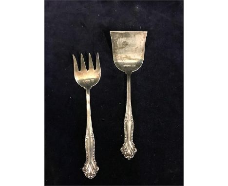 A silver knife and fork (27g)