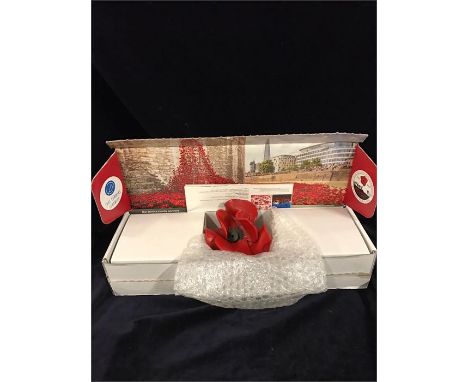 A ceramic poppy which formed part of the Blood-Swept Lands and Seas of Red by artist Paul Cummins. Important Notice All proce