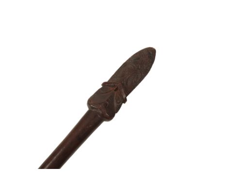 A FINE MAORI TAI-AHA FIGHTING STAFF 19th century possibly earlier, elongated form. finely carved terminous point spear head, 