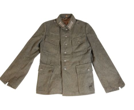 ORIGINAL MODEL 1942 GERMAN ARMY FIELD TUNIC  The tunic is tamped on the right inside.  '41/44; 98 79/81 Renr 083610096' The e