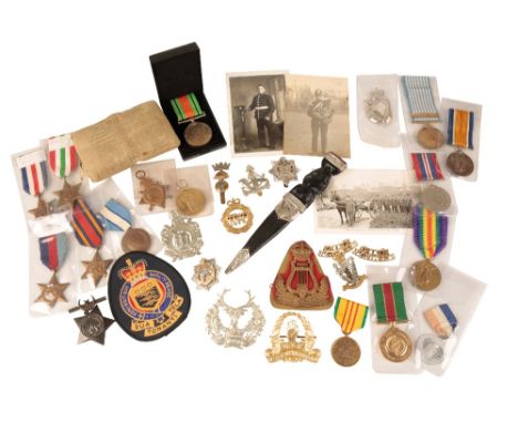 A COLLECTION OF CAP BADGES &amp; MEDALS  Including;  Cap Badges.  War Medal, Defence, Korea Nato.  1914/15 Star &amp; VM to 7