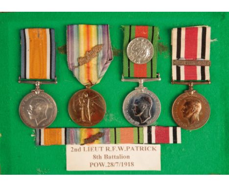 GREAT WAR PRISONER OF WAR GROUP TO CAPTAIN R F W PATRICK  Correctly impressed Pair - 2- Lieut R F W Patrick ( issued 1940)  S