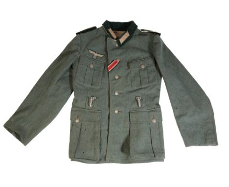 ORIGINAL MODEL 1938 GERMAN ARMY FIELD TUNIC  An excellent field worn example. The tunic is stamped on the right inside  41 41