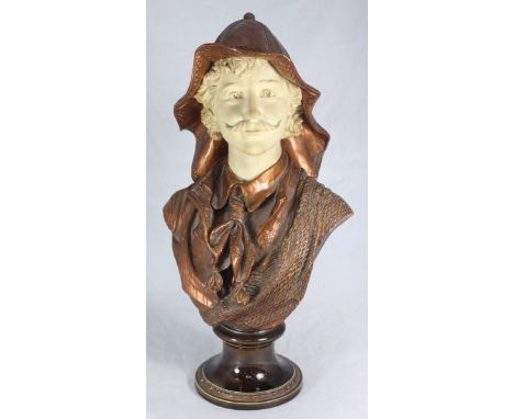 A 19th century earthenware bust of a moustached dandy fisherman, wearing Souwester hat, neck scarf and fishing nets draped ov