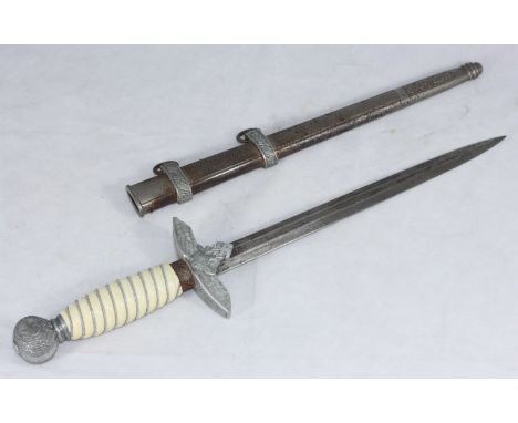 A WWII German Luftwaffe Officer's 2nd pattern dress dagger, with 10" double edged blade, cross guard with central eagle and s