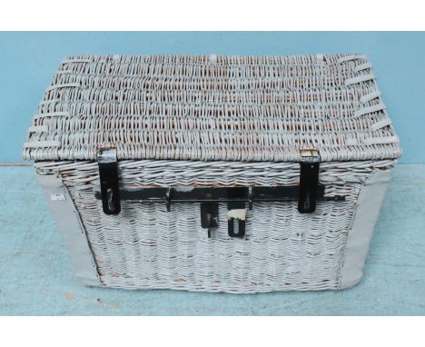 A light blue painted wicker chest with black metal strap-locks and rope handles to each side. 80cm wide.