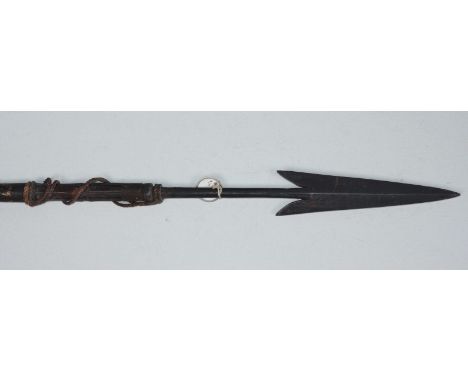 A late 19th century hunting / fishing spear, possibly Igorot people's, Philippines, the forged iron spear with two barbs and 