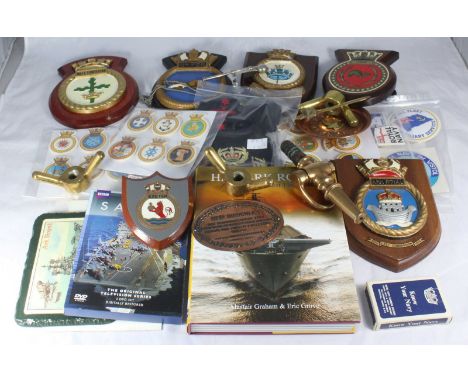A small collection of assorted Ark Royal related collectables and ephemera including a painted ships crest, a shell case, a p