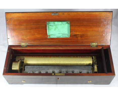 A rosewood and simulated rosewood music box by Nicole Freres, the top decorated with scrolling and floral inlay, playing 6 ai