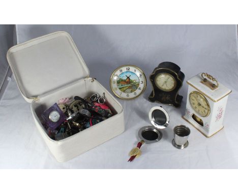 A quantity of costume jewellery and watches including a Dalvey collapsible hip flask and four various clocks in a wicker hamp