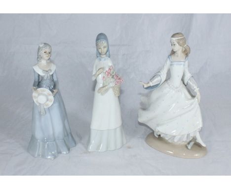 A Lladro figure of Cinderella No. 4828, approx. 25cm high, together with two Lladro style ladies (3)